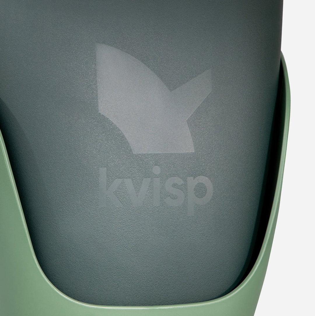 Detailed view of the backside of the Kvisp dog bike carrier showing off the nice texture and debossed Kvisp logo on the Forest Green seat #color_forest-green