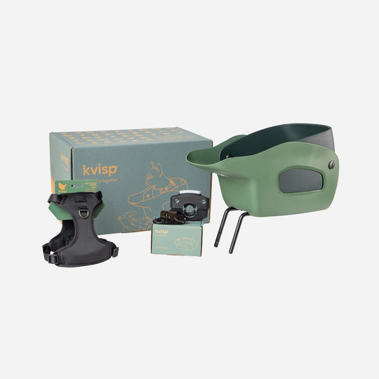 Overview of the contents of a Kvisp dog carrier box with safety harness mounting set and Kvisp basket #color_forest-green