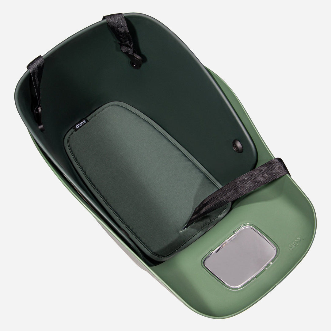 Showing the Forest Green comfort seat cushion placed into the Kvisp seat from the front #color_forest-green